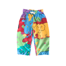 Load image into Gallery viewer, Colourful handmade children's pants with playful vintage animal print. By WONDERKIN